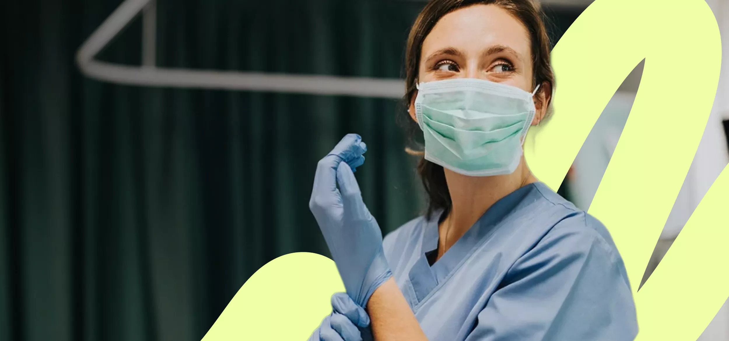 A healthcare professional wearing scrubs and a surgical mask looks to the side while adjusting a blue medical glove. The setting appears to be a clinical or hospital environment with dark green curtains in the background. A bright yellow abstract shape overlays part of the image, adding a modern graphic element. The overall scene conveys professionalism, safety, and calm confidence in a medical context.