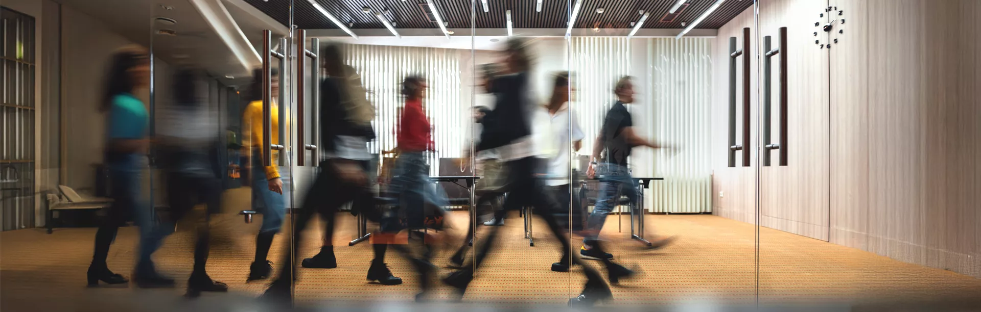 blured people walking through hallway