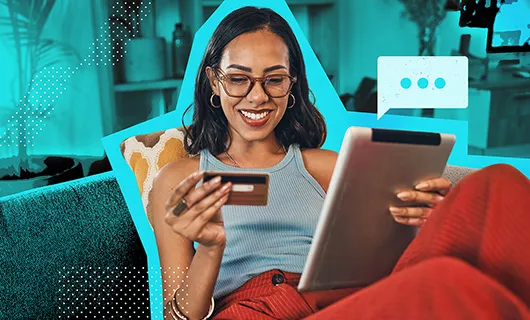 Woman Paying with Credit Card while shopping online