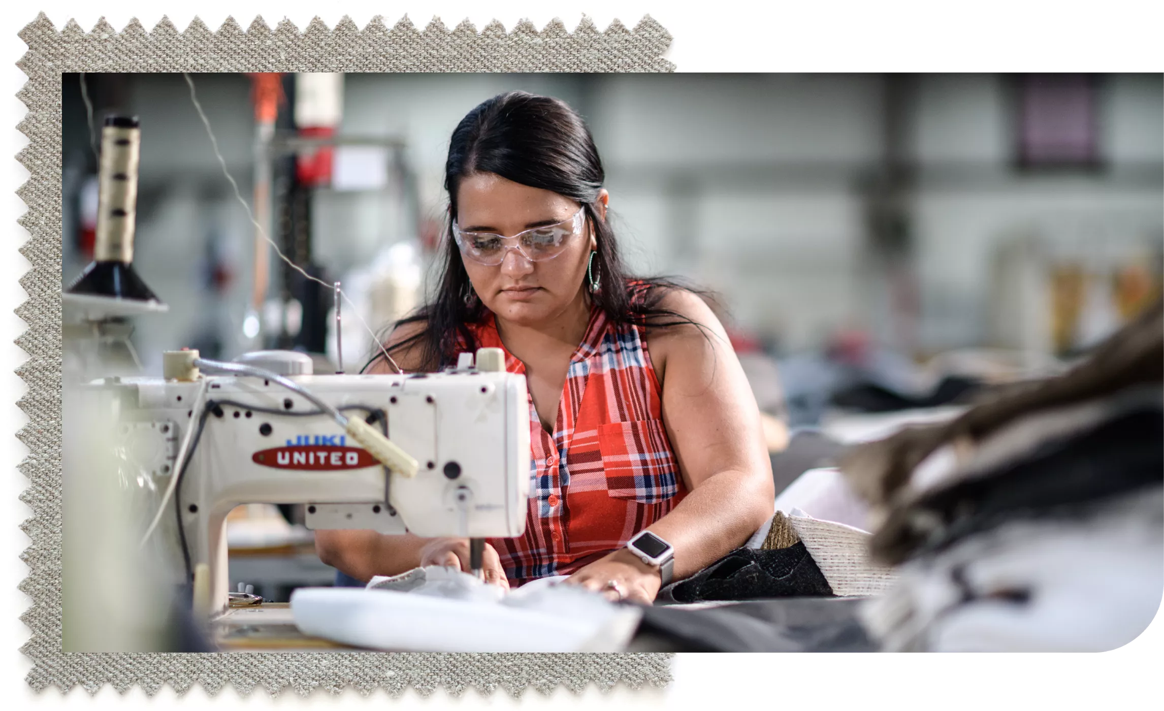 Industrial sewing machine in textile factory