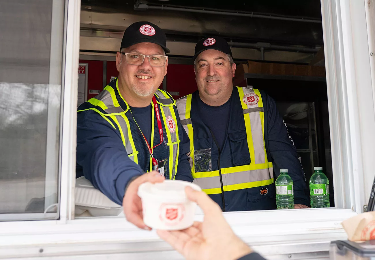 Relief workers handing out food