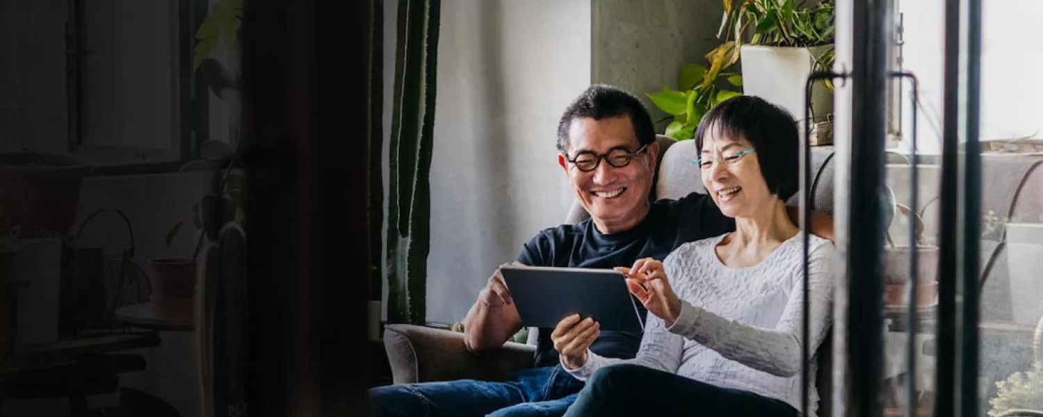 Two people looking at ipad