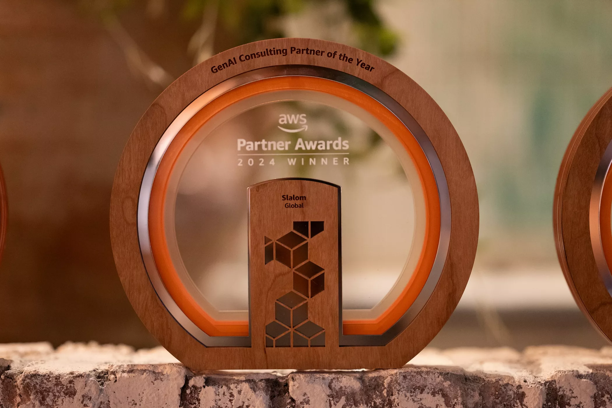 Picture of award received at re:Invent 2024: AWS GenAI Consulting Partner of the Year: Global