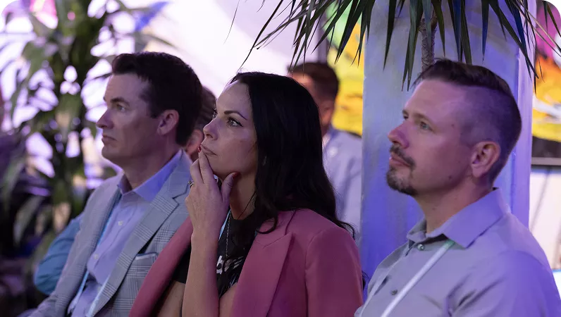 Audience seated at indoor event