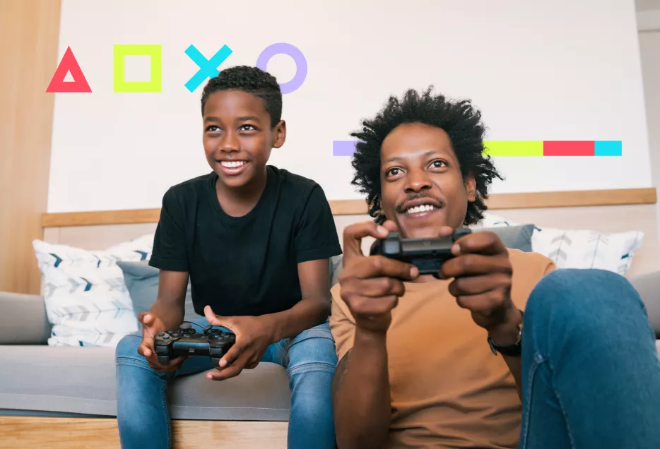 father and son playing video games