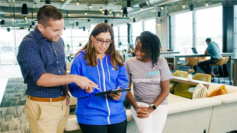 Collaborative team discussion in modern office