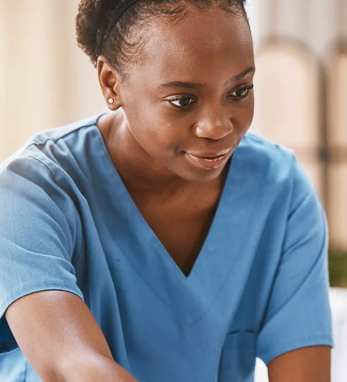 Woman healthcare professional comforting male patient