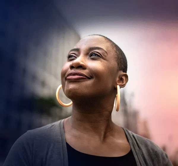 woman looking up at the sky