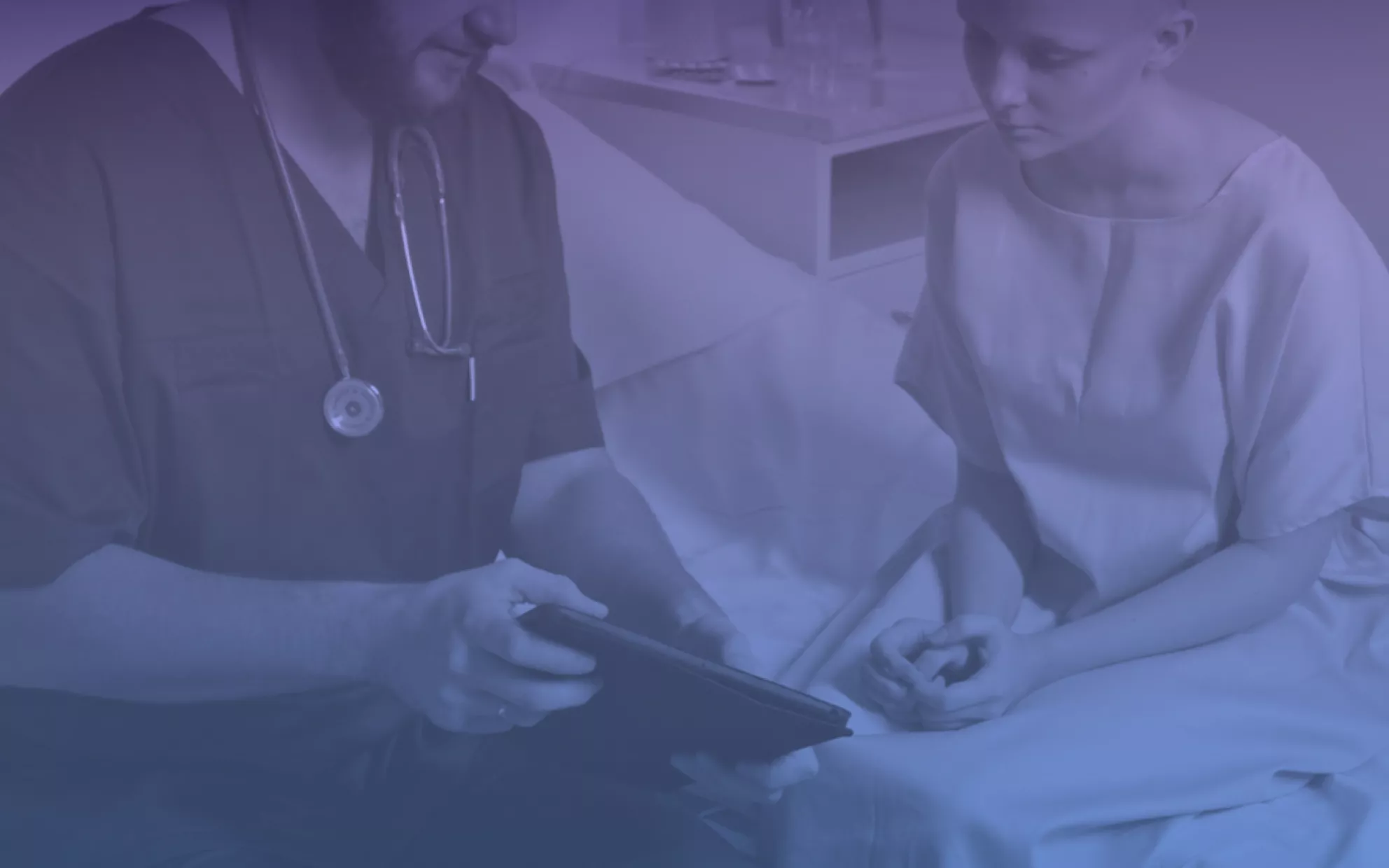 A healthcare professional sits beside a patient on a hospital bed, reviewing information on a digital tablet. The doctor wears medical scrubs and a stethoscope, suggesting a clinical or hospital setting. The patient appears attentive and slightly anxious, dressed in a hospital gown. The image is overlaid with a cool blue gradient, giving it a calm yet serious mood.