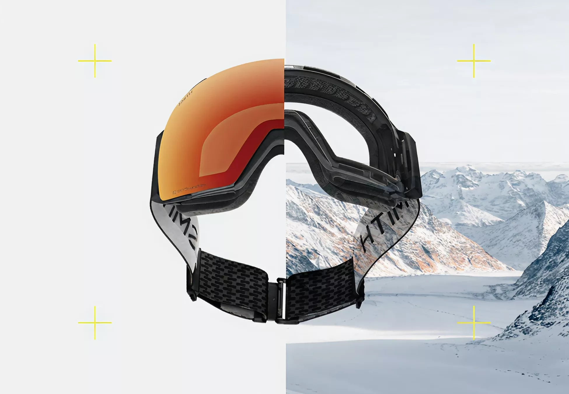 Image shows a pair of ski or snowboard goggles centered in a split-view composition. The left half highlights the front orange-tinted lens, while the right half reveals the black frame and strap. Behind the goggles, a snowy mountain landscape with rugged peaks and a wide valley is visible. Minimal graphic yellow crosses on a light background add a modern, technical feel.