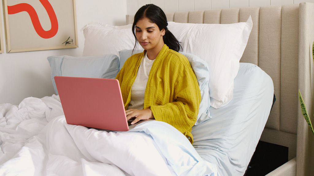 Couple sur un lit Bases ajustables