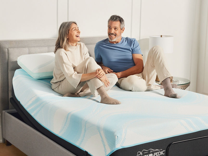 Couple on adjustable frame bed