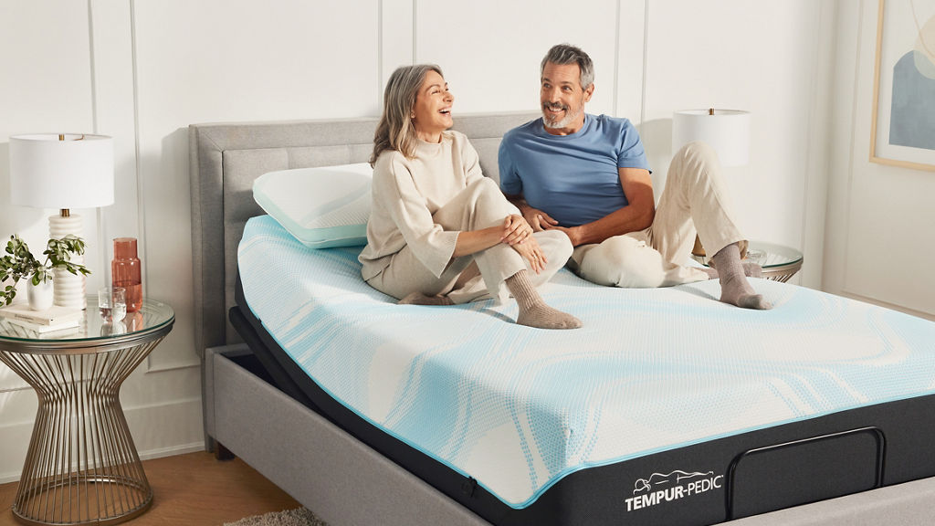 Couple on adjustable frame bed