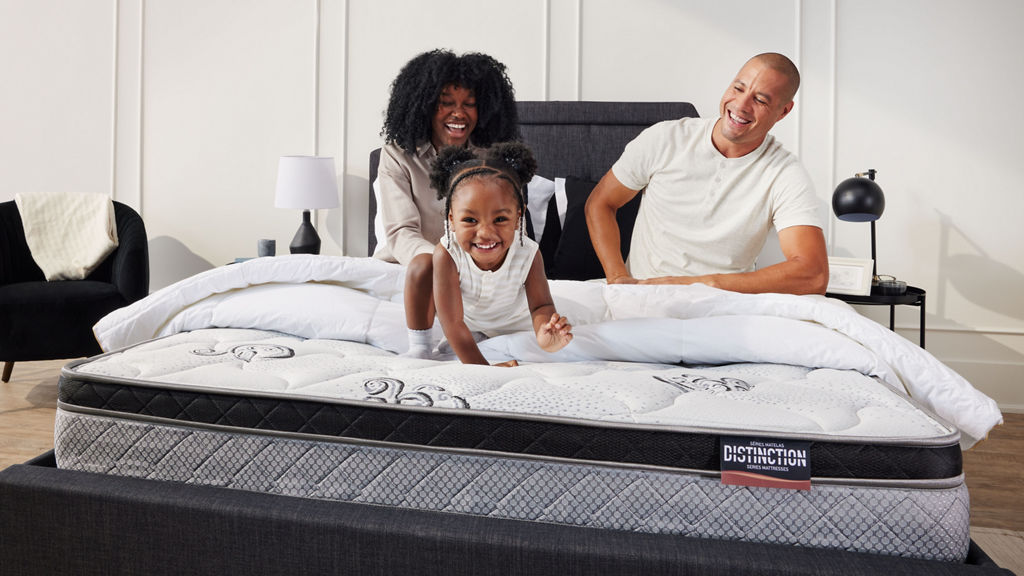 Famille sur un matelas Distinction