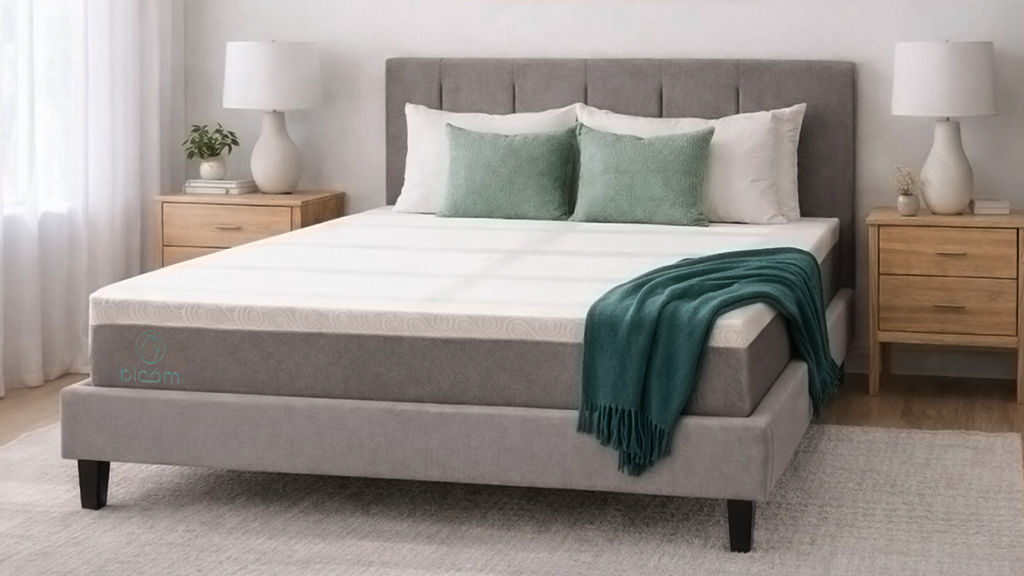 Mother Daughter sitting on Bloom Bed