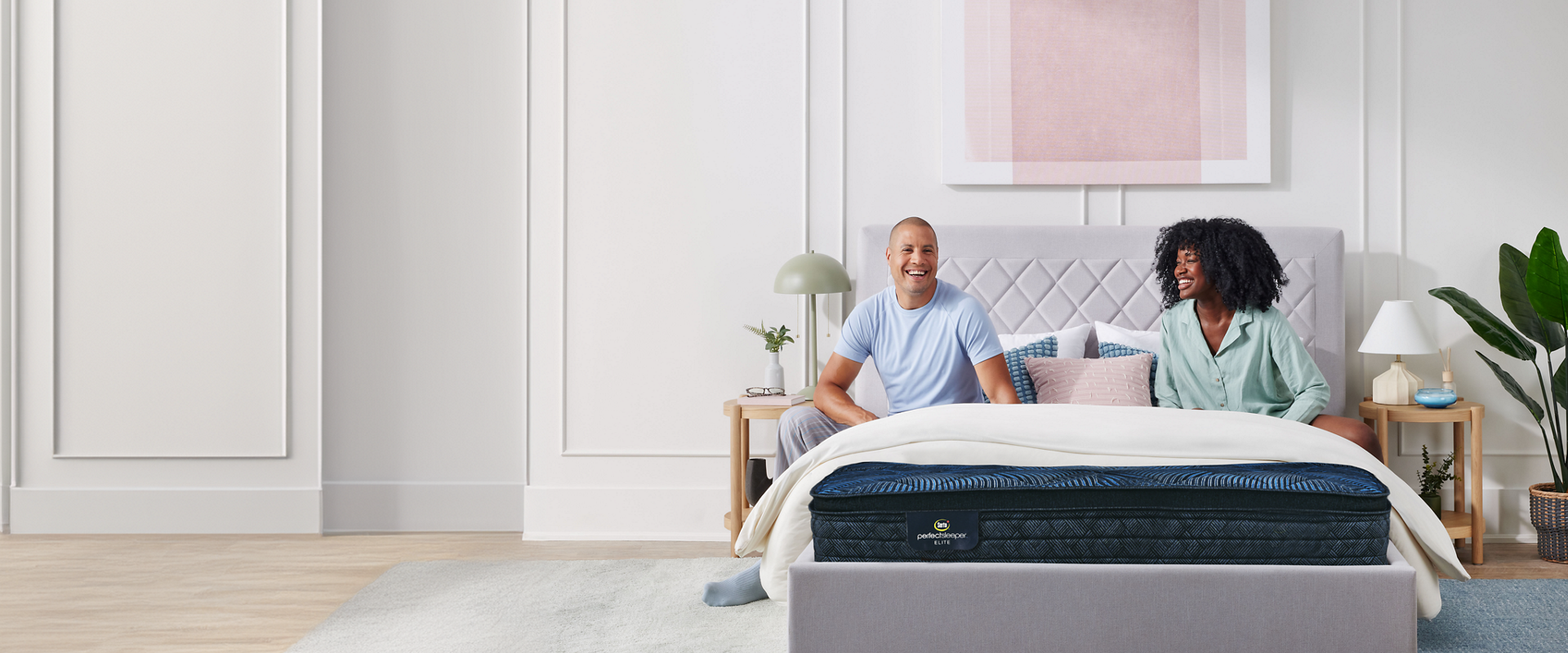 Couple on Serta mattress with bed frame