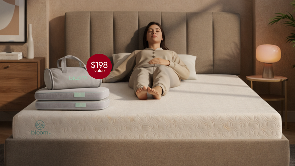 Mother Daughter sitting on Bloom Bed