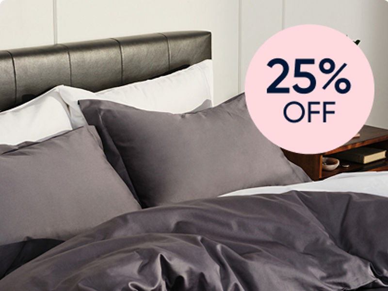 Couple with small child in bed