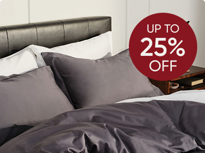 Couple with small child in bed