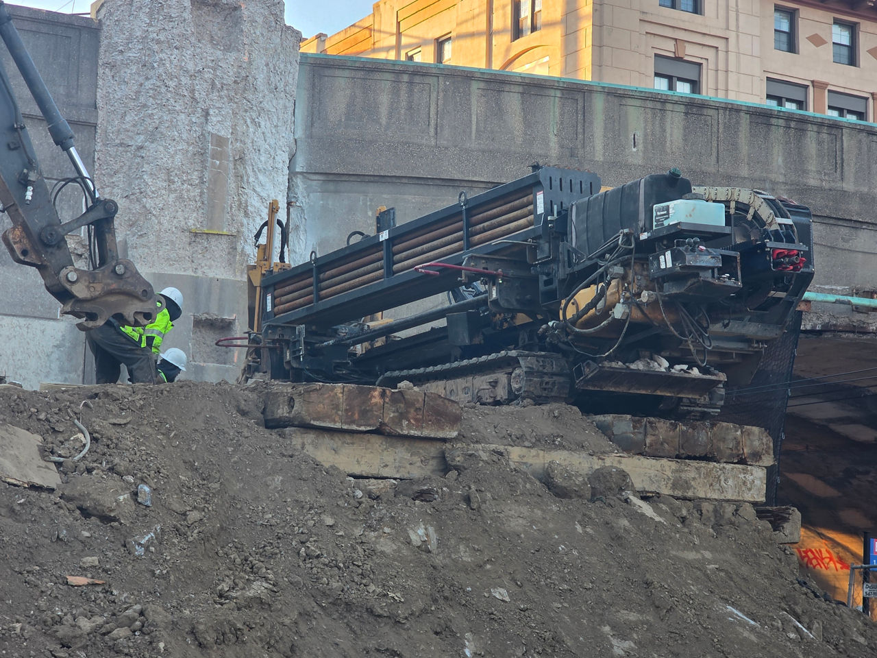 Drill perpendicular to bridge wall