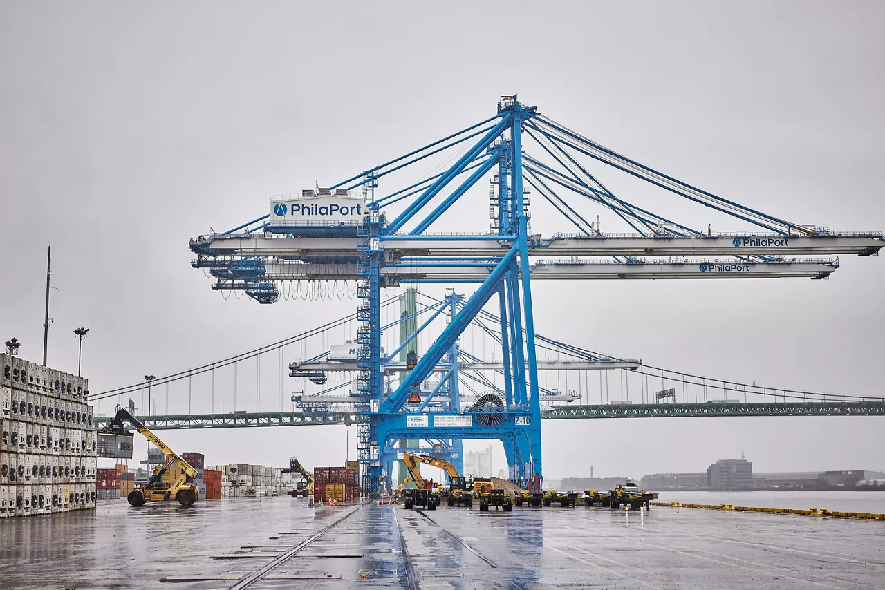Cargo cranes on a dock at the Port of Philadelphia on a cloudy day