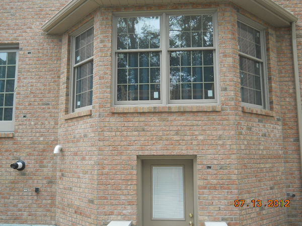 Completed with new brick, windows and door