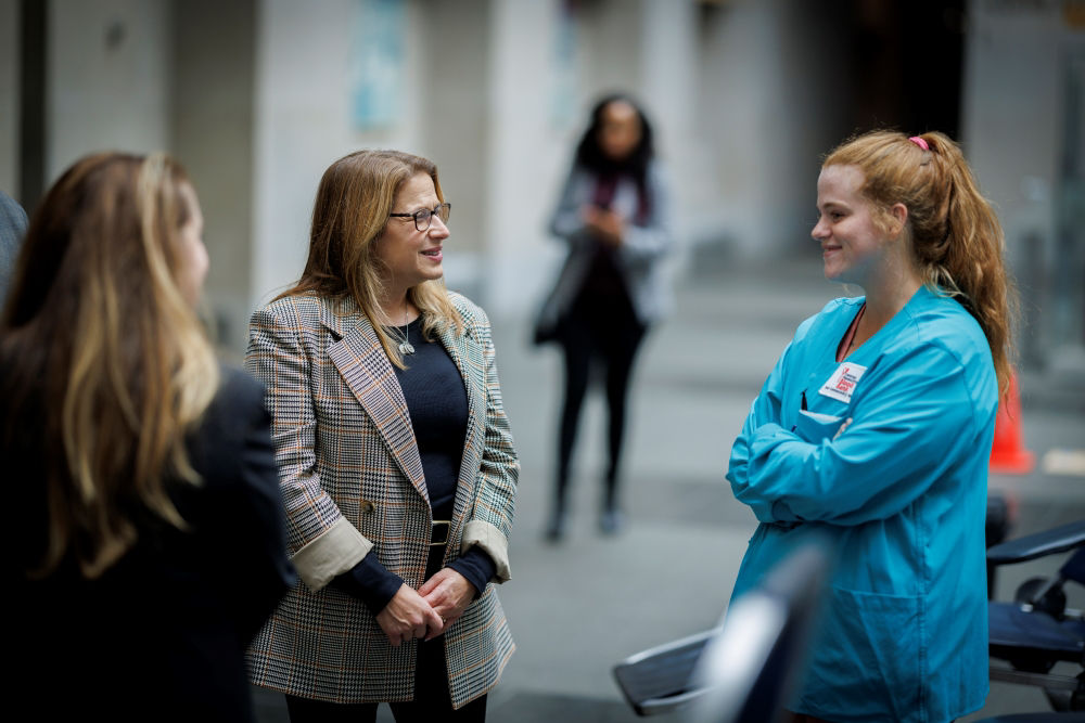 First Lady Lori Shapiro and speaks with a staff person at the blood drive