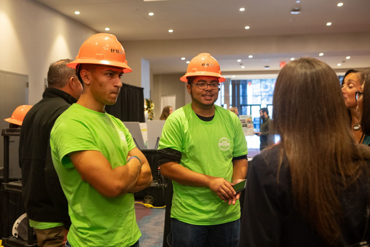 Pennsylvania Department of Labor & Industry Secretary Nancy A. Walker talking to apprentices in hard hats