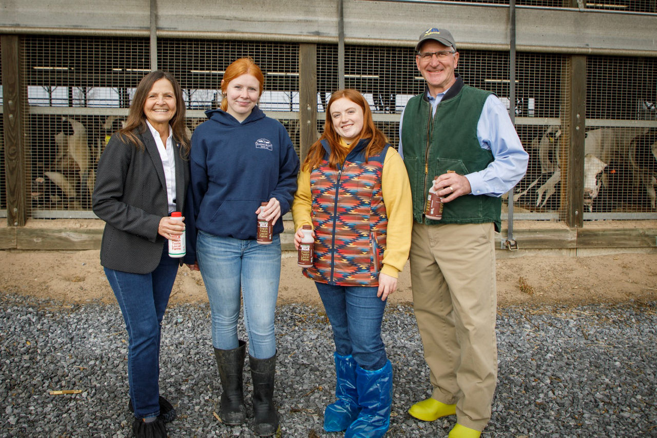 L&I Secretary Nancy A. Walker stands with Department of Agriculture's Secretary Redding at Berks County Dairy Farm