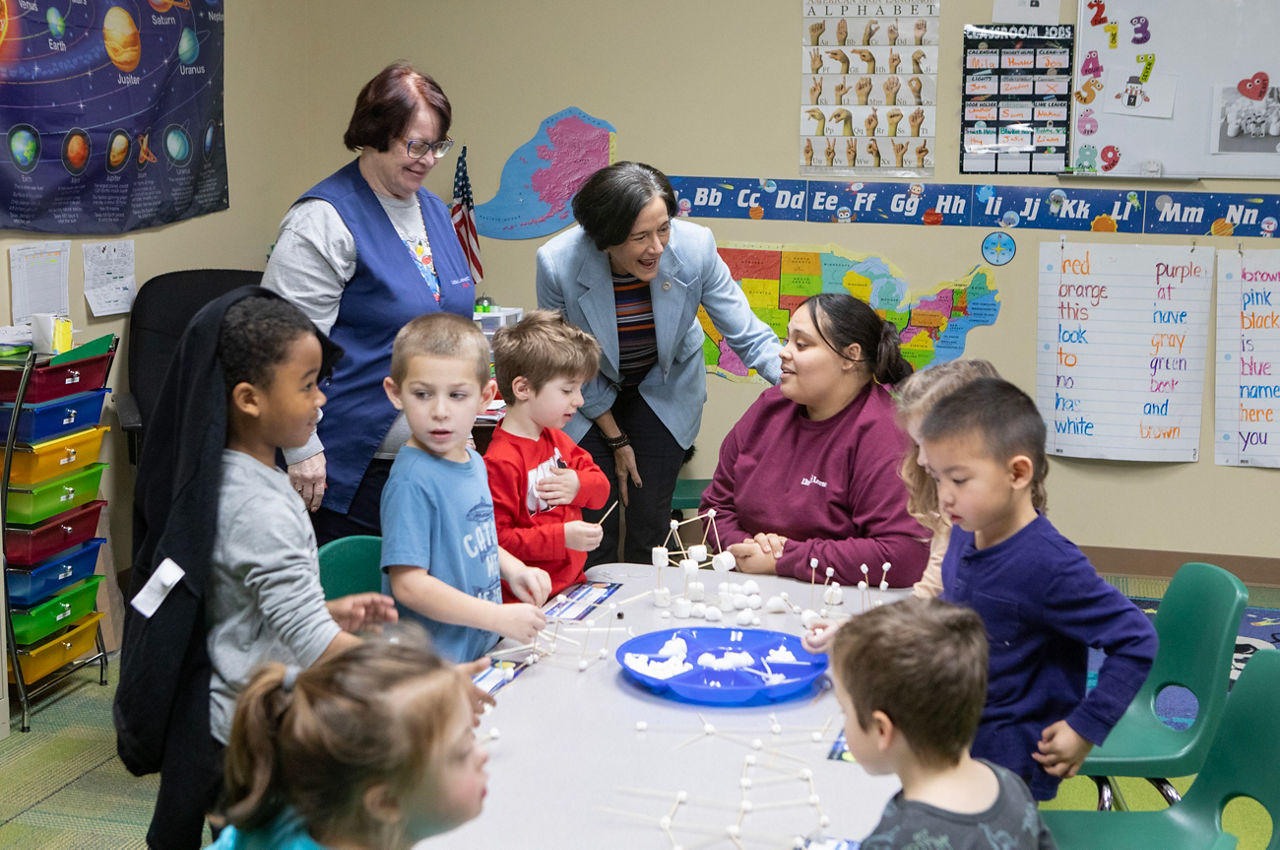 DHSecretary Val Arkoosh with a classrom of children at Little Learners