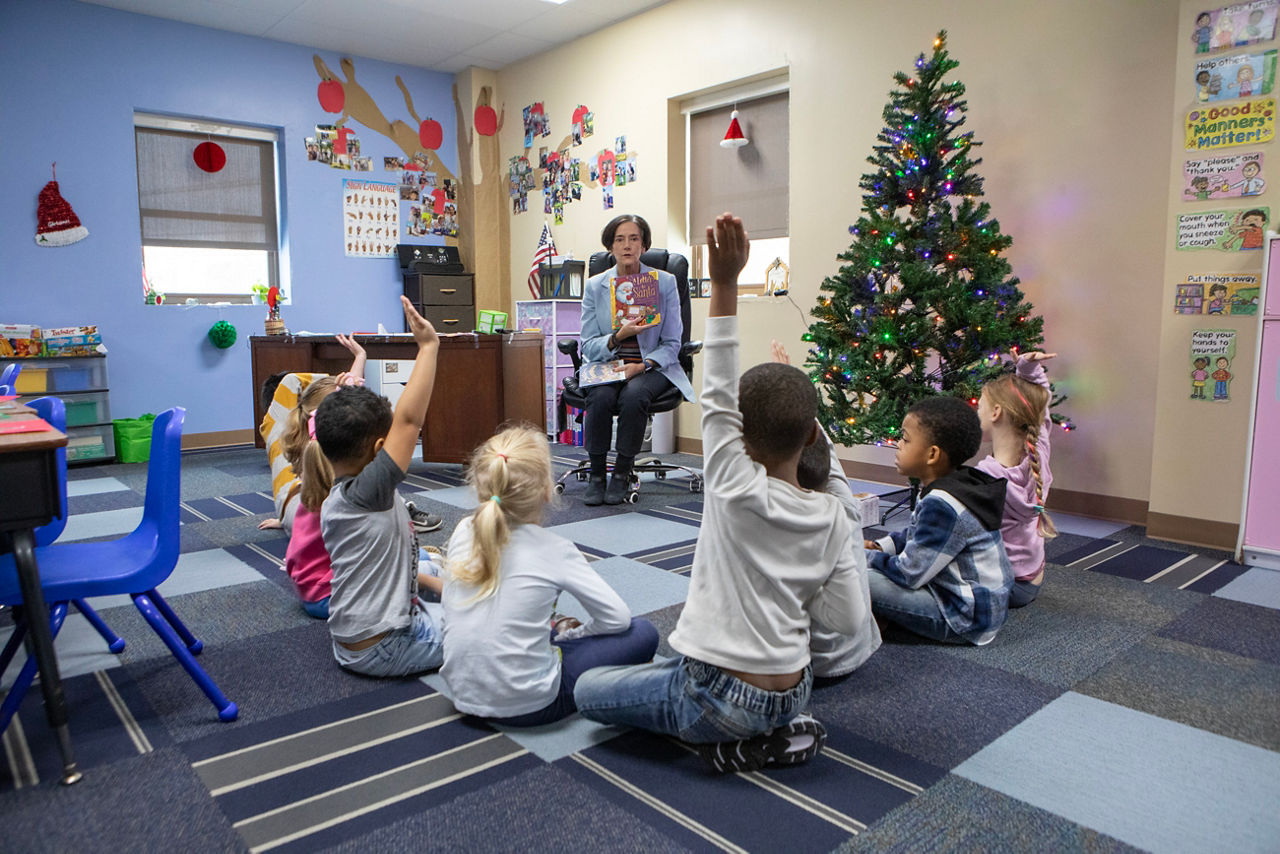 DHSecretary Val Arkoosh with a classrom of children at Little Learners