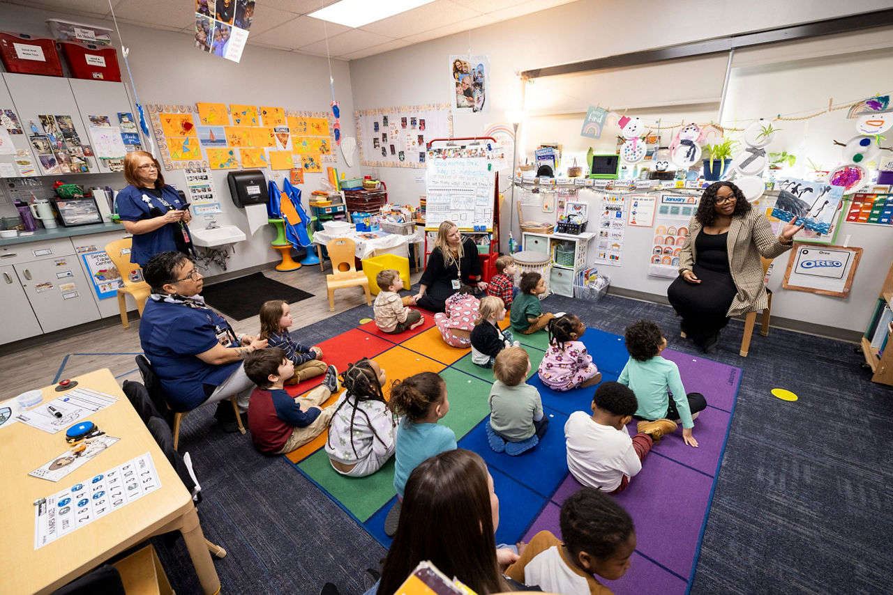 OCDEL Deputy Secretary Shante Brown reads to children