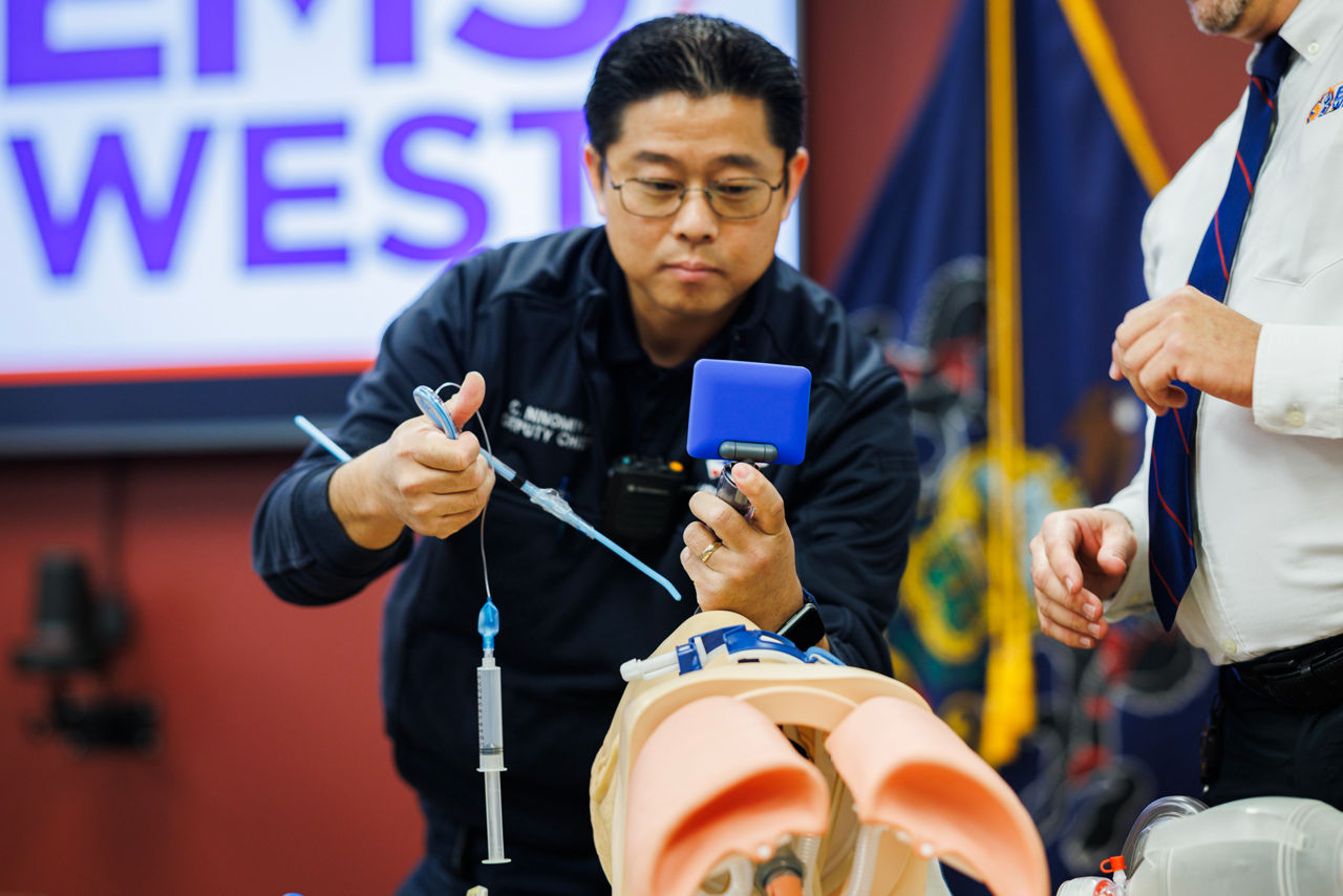 Picture of EMS Provider Demonstrating Laryngoscope
