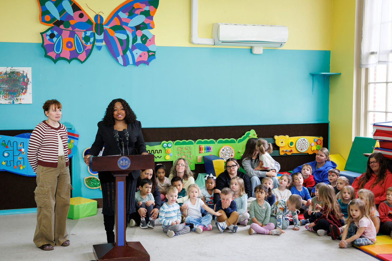 OCDEL Deputy Secretary Shante Brown speaks at the podium