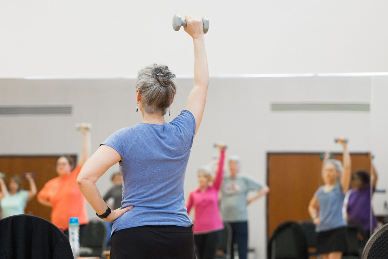 Picture of Secretary of Health Dr. Debra Bogen exercising at SilverSneakers class