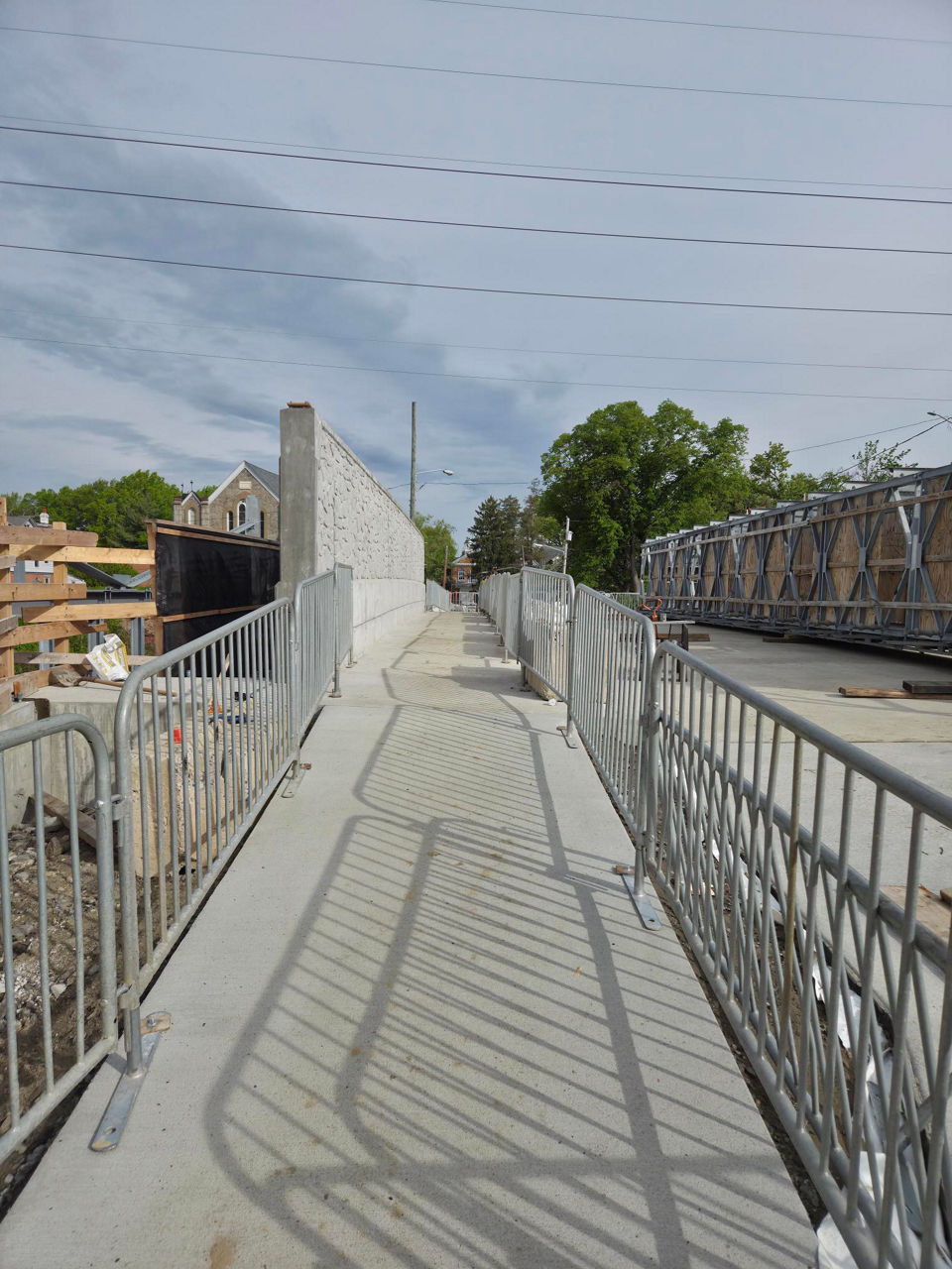 Long view of new sidewalk along Sellers Avenue Bridge