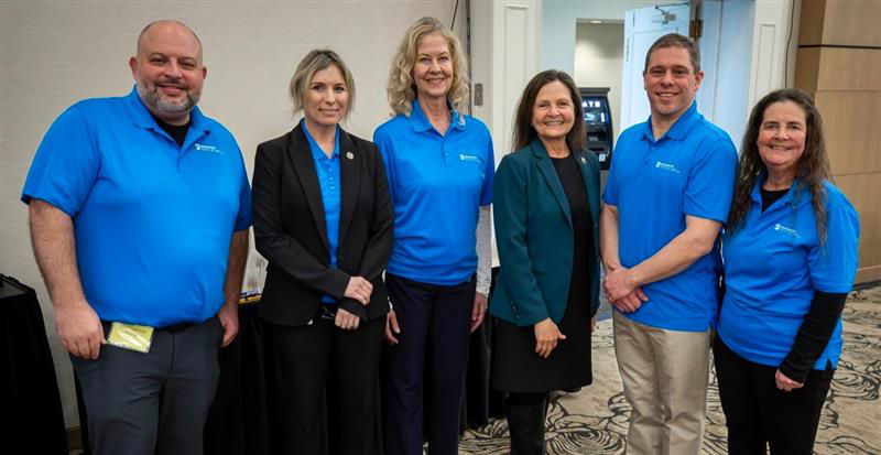L and I Secretary Nancy A. Walker stands with staff from the Office for the Deaf and Hard of Hearing at their annual Hearing Loss Expo in Cumberland County, Pennsylvania.