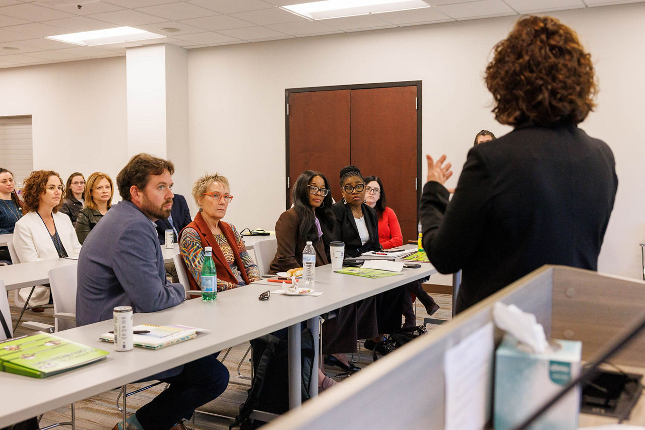 Be a Part of the Conversation Executive Director Kim Porter speaks during a question-and-answer session about family recovery support, as Pennsylvania Department of Drug and Alcohol Programs Secretary Dr. Latika Davis-Jones and audience members look on.