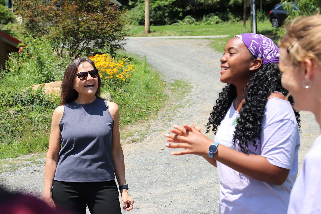 Department of Labor and Industry Secretary Nancy A. Walker talks with students at LEAF Project Home Farm in Perry County