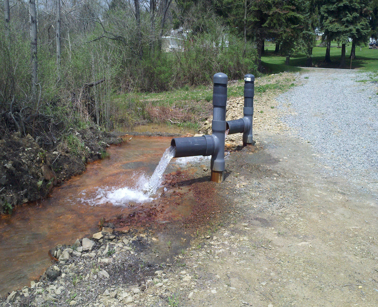 Picture of and outfall from an acid mine.