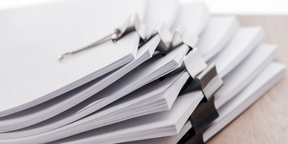 Pile of documents on a desk
