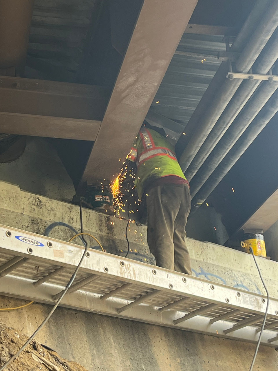 Welding under the bridge