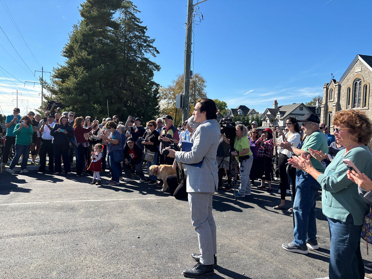 Group celebrating Sellers Avenue reopening.