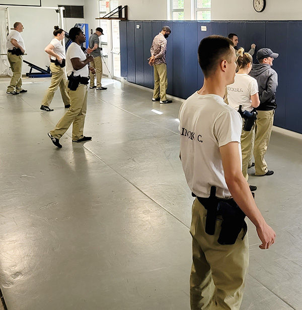 LEO trainees training in a gym