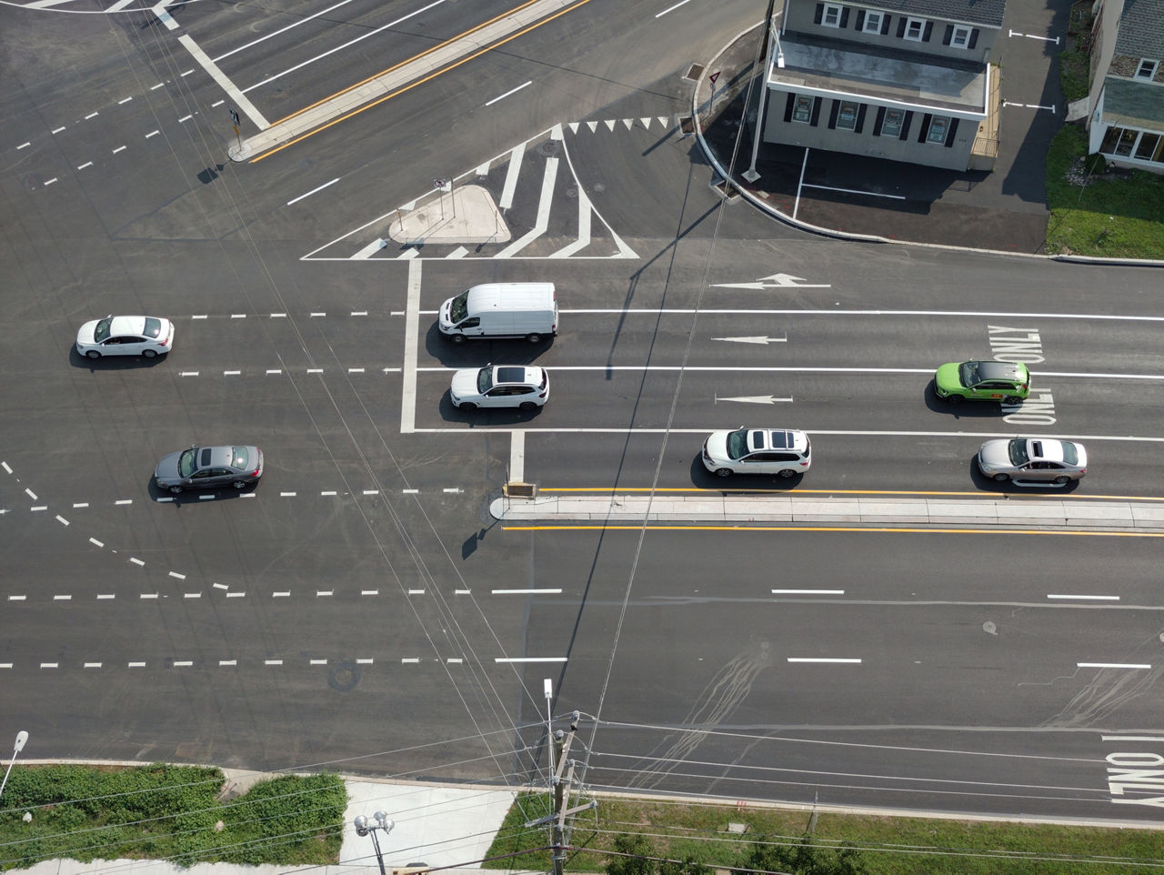 Cars approaching Five Points intersection after improvements