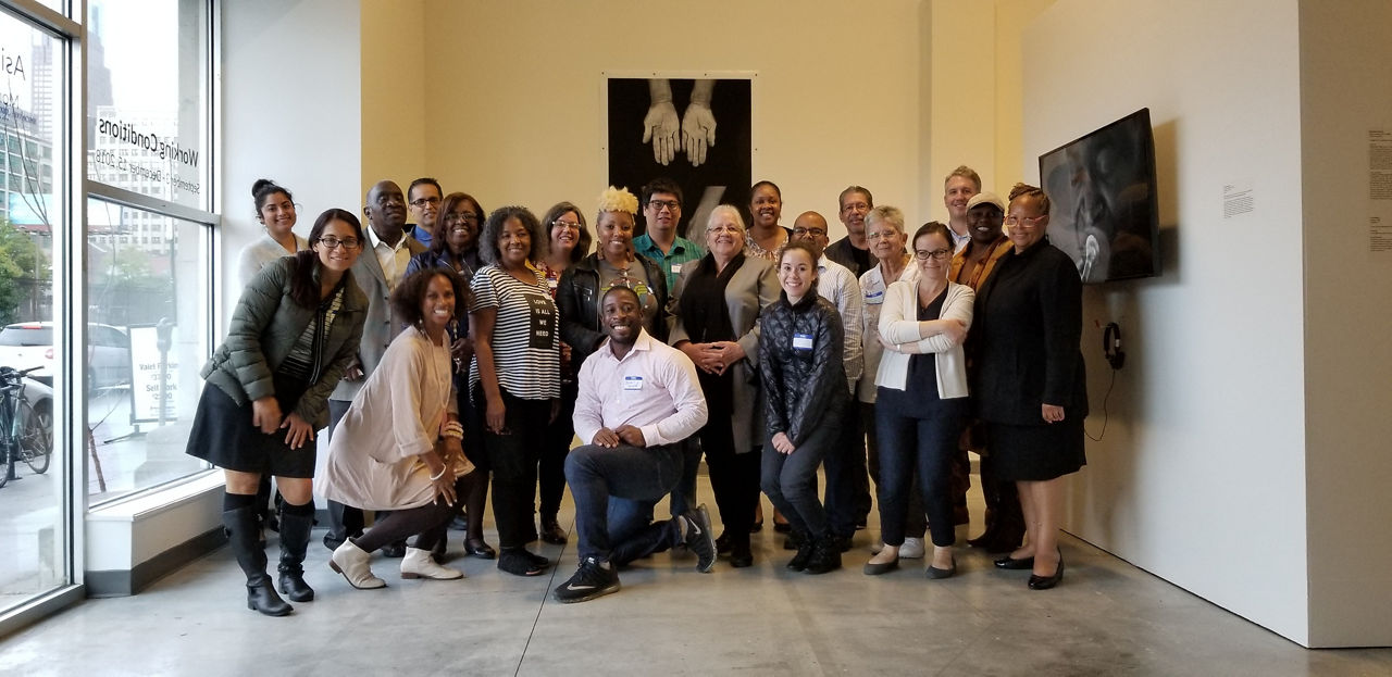 Strategies for Success participants - a group of more than 20 BIPOC individuals - pose together at a training.