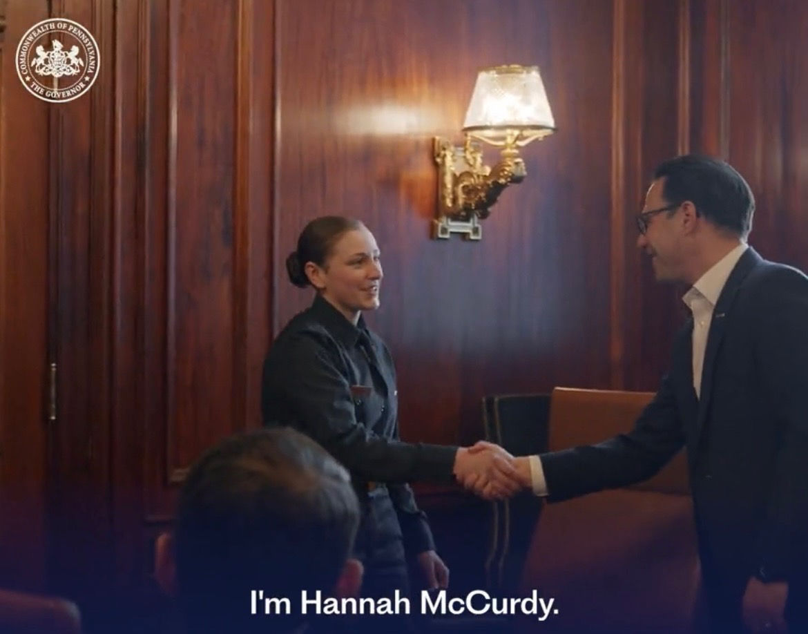 Screenshot of a video of a woman with the caption "I'm Hannah McCurdy"