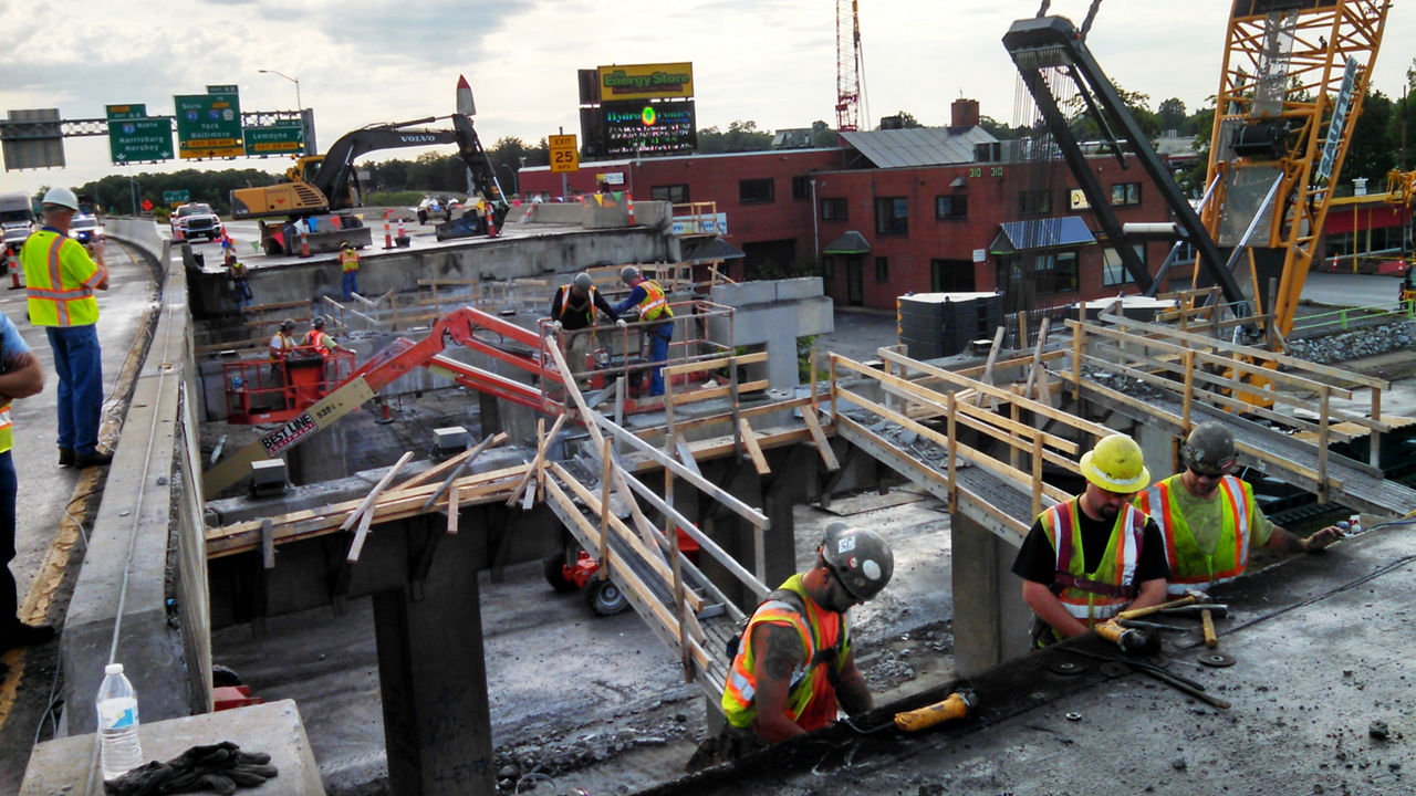 construction crew working on bridge