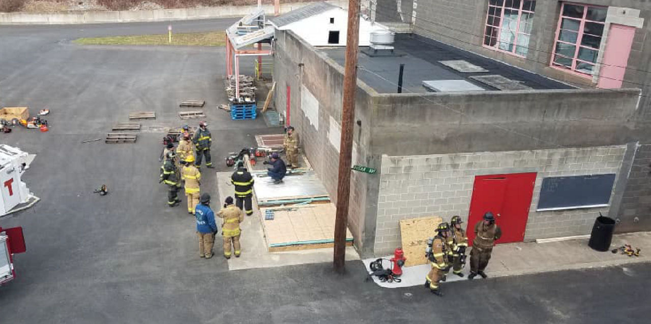 Firefighters train on the Fire Academy grounds in Lewistown.