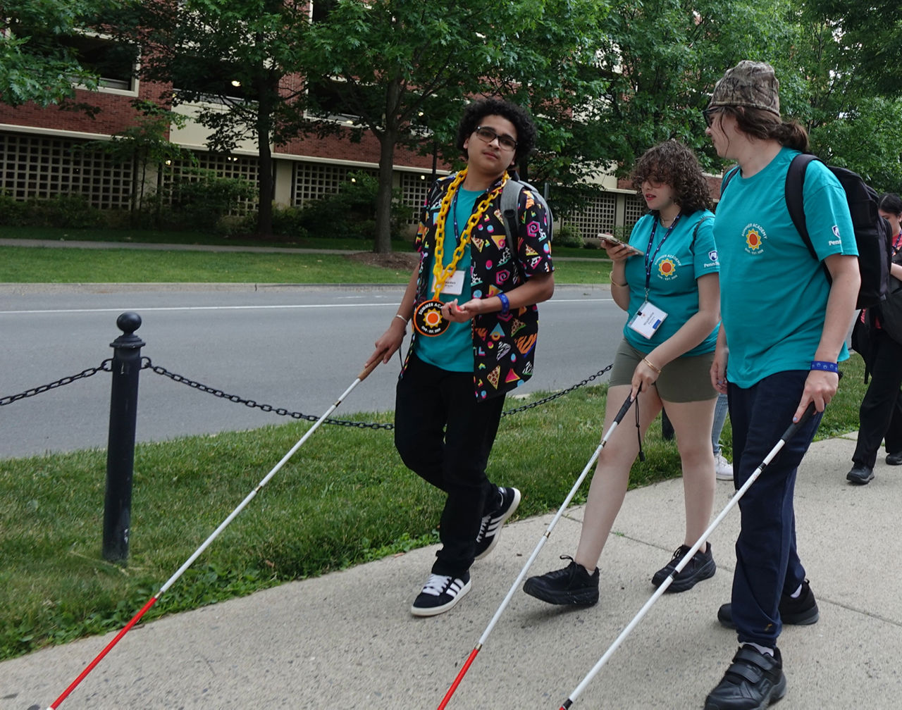 BBVS Summer Academy students utilize white canes on the sidewalk